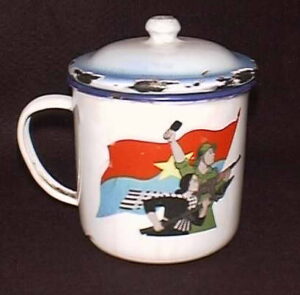This extremely rare Viet Cong cup was purchased at the military market in Saigon in 1998 by Bill Kimball. The commemorative cup honors the victory of the National Liberation Front in 1975. The cup has the Liberation’s official stamp on the bottom of the cup.